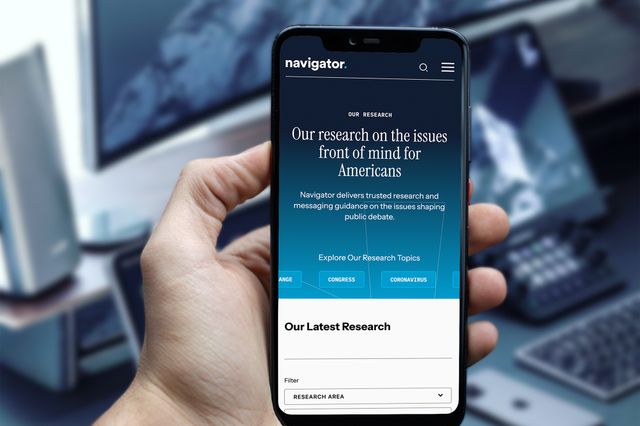 woman-holding-phone-browsing-moms-first-site